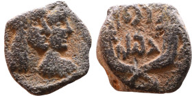 Aretas IV Philopatris (King of the Nabataeans: 9 BC – 40 AD) Bronze coin. Obverse: Jugate busts of Aretas IV and Shugailat Reverse: Crossed cornucopia...
