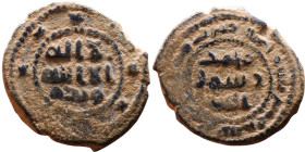 Umayyad/Abbasid. Bronze coin. Obverse: Arabic inscription. Reverse: Arabic inscription

19mm 3,74g
