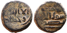 Umayyad/Abbasid. Bronze coin. Obverse: Arabic inscription. Reverse: Arabic inscription

14mm 3,59g