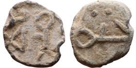 Late Roman / Byzantine period - Lead seal

12mm 3,08g