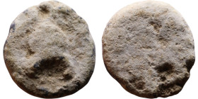 Late Roman / Byzantine period - Lead seal

13mm 3,69g