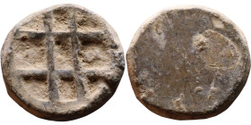 Late Roman / Byzantine period - Lead seal

14mm 3,40g