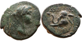 Antiochus IV Epiphanes (Seleukid King: 175-172 BC). AE bronze. Obv.: Veiled, diademed bust of Laodice IV right Rev.: Elephant head left, to r. Tripod...