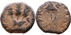 JUDAEA. Jerusalem mint. Agrippa I (under Claudius, 37-44 AD). AE prutah. Obv.: ΒΑCΙΛΕWC ΑΓΡΙΠΑ; Umbrella-like canopy with fringes. Rev.: Three ears of...