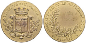 ALGÉRIE - ALGERIA
IIIe République (1870-1940). Médaille, Association des cours industriels d’Oran ND (attribution en 1921).
Esc.- ; Bronze doré - 23,1...