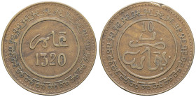 MAROC - MOROCCO
Abdül Aziz I (1894-1908). 10 mouzounas, frappe médaille AH 1320 (1902).
Lec.82a ; Bronze - 10,05 g - 30 mm - 12 h
Une marque sur la tr...