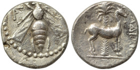 PHOENICIA. Arados. Circa 2nd century BC. Drachm (silver, 4.04 g, 16 mm). Bee with straight and open wings. Rev. Stag standing to right; behind, palm t...