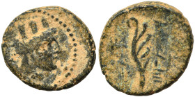 PHOENICIA. Arados. 2nd-1st century BC. Ae (bronze, 1.52 g, 12 mm). Turreted head of Tyche right, palm branch behind. Rev. Aphlaston, Phoenician letter...