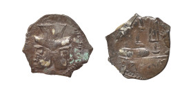 Greek. Ar (silver, 0.29 g, 9 mm). Janiform head. Rev. Dagger, other uncertain items. Nearly very fine.