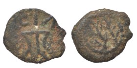 JUDAEA. Herodians. Herod I, 40-4 BC. Half Prutah (bronze, 0.62 g, 11 mm), Jerusalem. [HPΩΔΟΥ BA]CIΛ[EOC] Tripod. Rev. Grape bunch on vine. Meshorer 58...