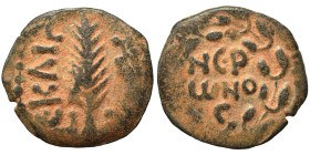 JUDAEA. Procurators. Porcius Festus, 59-62. Prutah (bronze, 1.83 g, 16 mm), Jerusalem. NЄP-ѠNO-C in three lines within wreath. Rev. L Є KAIC-APOC Palm...