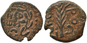 JUDAEA. Procurators. Porcius Festus, 59-62. Prutah (bronze, 1.51 g, 14 mm), Jerusalem. NЄP-ѠNO-C in three lines within wreath. Rev. L Є KAIC-APOC Palm...