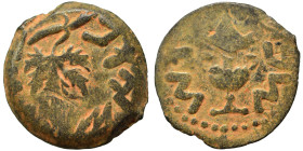 JUDAEA. First Jewish War, 66-70 AD. Prutah (bronze, 2.26 g, 15 mm), 68-69 / year 3. Amphora. Rev. Vine leaf on branch with tendril. Hendin 6392. Nearl...