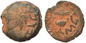 JUDAEA. First Jewish War, 66-70 AD. Prutah (bronze, 3.26 g, 16 mm), 68-69 / year 3. Amphora. Rev. Vine leaf on branch with tendril. Hendin 6392. Nearl...