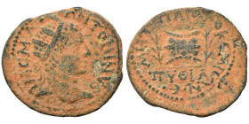 SYRIA, Seleucis and Pieria. Emesa. Elagabalus, 218-222. Ae (bronze, 8.48 g, 24 mm). Radiate head of Elagabalus to right. Rev. Prize urn between two pa...