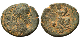SYRIA, Coele-Syria. Damascus. Septimius Severus, 193-211. Ae (bronze, 6.56 g, 20 mm). Laureate head right. Rev. Tyche seated left on rocks, holding un...