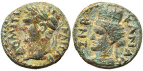 SYRIA, Decapolis. Canatha. Domitian, 81-96. (bronze, 2.46 g, 14 mm). ΔOMITI KAICAP Laureate head of Domitian to left. Rev. KANATA / ZNP Turreted and d...