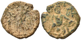 PALMYRENE. Palmyra. Pseudo-autonomous issue, circa 1st-3rd centuries AD. Ae (bronze, 1.78 g, 13 mm). Female figure (Tyche?) seated to left; uncertain ...