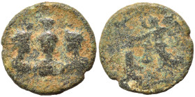 PALMYRENE. Palmyra. Pseudo-autonomous issue, circa 1st- 3rd centuries AD. Ae (bronze, 2.39 g, 15 mm). Facing draped bust of Baal, wearing polos, betwe...