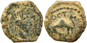 ARABIA. Bostra. Time of Commodus, 177-192. Ae (bronze, 1.07 g, 11 mm). Turreted and draped bust of Tyche right; O (date) in left field. Rev. Camel sta...