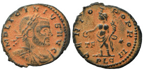 Licinius I, 308-324. Follis (bronze, 2.83 g, 21 mm), Lugdunum. IMP LICINVIS P F AVG Laureate and cuirassed bust right. Rev. GENIO POP ROM Genius stand...