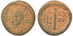 Justinian I, 527-565. Decanummium (bronze, 3.25 g, 17 mm), Rome. D N IVSTINIANVS P AV Helmeted, diademed and cuirassed bust of Justinian I facing, hol...