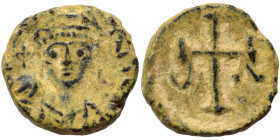 Justinian I, 527-565. Nummus (bronze, 0.76 g, 9 mm), Carthage. Helmeted and cuirassed bust facing, holding globus cruciger and shield. Rev. Monogram 6...