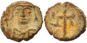 Justinian I, 527-565. Nummus (bronze, 0.59 g, 8 mm), Carthage. Helmeted and draped bust facing, star to left. Rev. Christogram with A and ω flanking (...