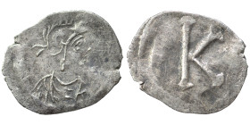 Anonymous. Time of Justinian, circa 530 or later. Siliqua or Scripulum(?) (silver, 0.41 g, 15 mm), Constantinople. Helmeted and draped bust of Constan...