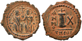 Justin II, with Sophia. 565-578. Decanummium (bronze, 3.60 g, 21 mm), Theoupolis (Antioch). Justin II, holding scepter in his right hand, and Sophia, ...