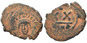 Phocas, 602-610. Half Follis (bronze, 5.21 g, 27 mm), Constantinople. δ N FOCA PЄRP AVG Crowned bust facing, wearing consular robes, holding mappa and...