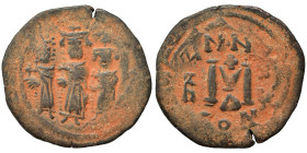Heraclius, with Martina and Heraclius Constantine, 610-641. Follis (bronze, 5.46 g, 26 mm), Constantinople Heraclius between Martina, on left, and Her...