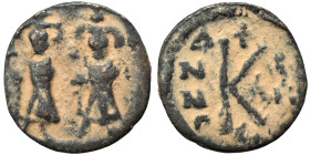 Heraclius, with Heraclius Constantine (?), 610-641. Half follis (bronze, 1.09 g, 15 mm). Two imperial figures standing, facing. Rev. Large K, legend a...