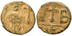 Constans II, 641-668. Follis (bronze, 2.57 g, 14 mm), Alexandria. Constans standing facing, holding long staff surmounted by staurogram in right hand ...
