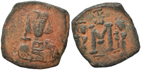 Constantine IV Pogonatus, with Heraclius and Tiberius, 668-685. Follis (bronze, 2.40 g, 23 mm), Syracuse, 668-674. Helmeted and draped bust of Constan...