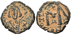 Tiberius III Apsimar, 698-705. Follis (bronze, 4.90 g, 23 mm), Constantinople. Crowned and cuirassed bust facing, holding shield and spear. Rev. Large...