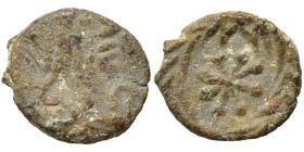 VANDALS. Anonymous, circa mid-late 5th century. Nummus (bronze, 0.60 g, 9 mm), uncertain mint (Carthage?). Diademed and draped bust to right. Rev. Sta...