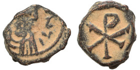 VANDALS. Pseudo-Imperial coinage, 548-565. Nummus (bronze, 0.83 g, 9 mm), Carthage, in the name of Justinian I. Bust right. Rev. Christogram. BMC Vand...