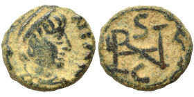 OSTROGOTHS. Athalaric, 526-534. Nummus (bronze, 1.01 g, 9 mm), Rome. In the name of Justinian I. Diademed, draped and cuirassed bust right. Rev. Monog...