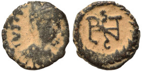 OSTROGOTHS. Athalaric, 526-534. Nummus (bronze, 0.86 g, 10 mm), Rome. In the name of Justinian I. Diademed, draped and cuirassed bust right. Rev. Mono...
