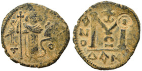 Arab-Byzantine. Fals (bronze, 3.31 g, 19 mm). Dimashq (Damascus). Struck circa 670-680 or later. Standing imperial figure, holding long cross and glob...