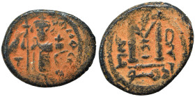 Arab-Byzantine. Circa 680-693 AD. Fals (bronze, 3.62 g, 19 mm), Dimashq (Damascus). Imperial figure standing, facing, holding long cross in his right ...