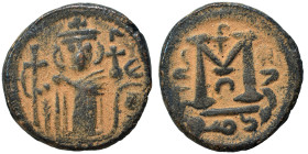 Arab Byzantine. Umayyad Caliphate, circa 685-693 AD. Fals (bronze, 4.23 g, 18 mm), Dimashq (Damascus). Standing imperial figure, holding long cross an...