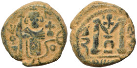 Arab Byzantine. Umayyad Caliphate, circa 685-693 AD. Fals (bronze, 4.13 g, 17 mm), Dimashq (Damascus). Standing imperial figure, holding long cross an...