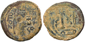 Arab Byzantine. Umayyad Caliphate, circa 685-693 AD. Fals (bronze, 4.76 g, 23 mm), Dimashq (Damascus). Standing imperial figure, holding long cross an...