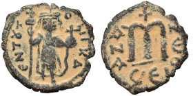 Constans II, 641-668. Follis (bronze, 3.56 g, 23 mm). Standing imperial figure, holding long cross and globus cruciger. Rev. Large m between A/N/A and...