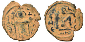 Arab-Byzantine. Umayyad Caliphate. temp. Mu'awiya I ibn Abi Sufyan , AH 41-60 / AD 661-680. Fals (bronze, 2.93 g, 24 mm), Hims (Emesa). Imperial figur...