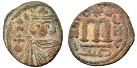 Arab Byzantine. Umayyad Caliphate. temp. Mu'awiya I ibn Abi Sufyan, AH 41-60 / 661-680 AD. Fals (bronze, 3.68 g, 19 mm), Hims (Emesa). Imperial bust f...