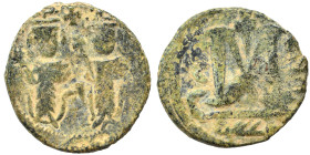 Arab-Byzantine. Umayyad Caliphate, circa 685-705 AD. Fals (bronze, 2.97 g, 16 mm), Dimashq (Damascus). Two imperial standing figures, each holding cru...