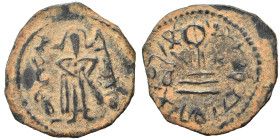 Umayyad Caliphate. Abd al-Malik ibn Marwan, AH 65-86 / 685-705 AD. Fals (bronze, 2.99 g, 22 mm). 'Standing Caliph' type. Caliph standing facing, beard...